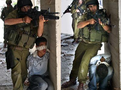 Israeli solider using boy as human shield while holding his rifle in an offensive posture.